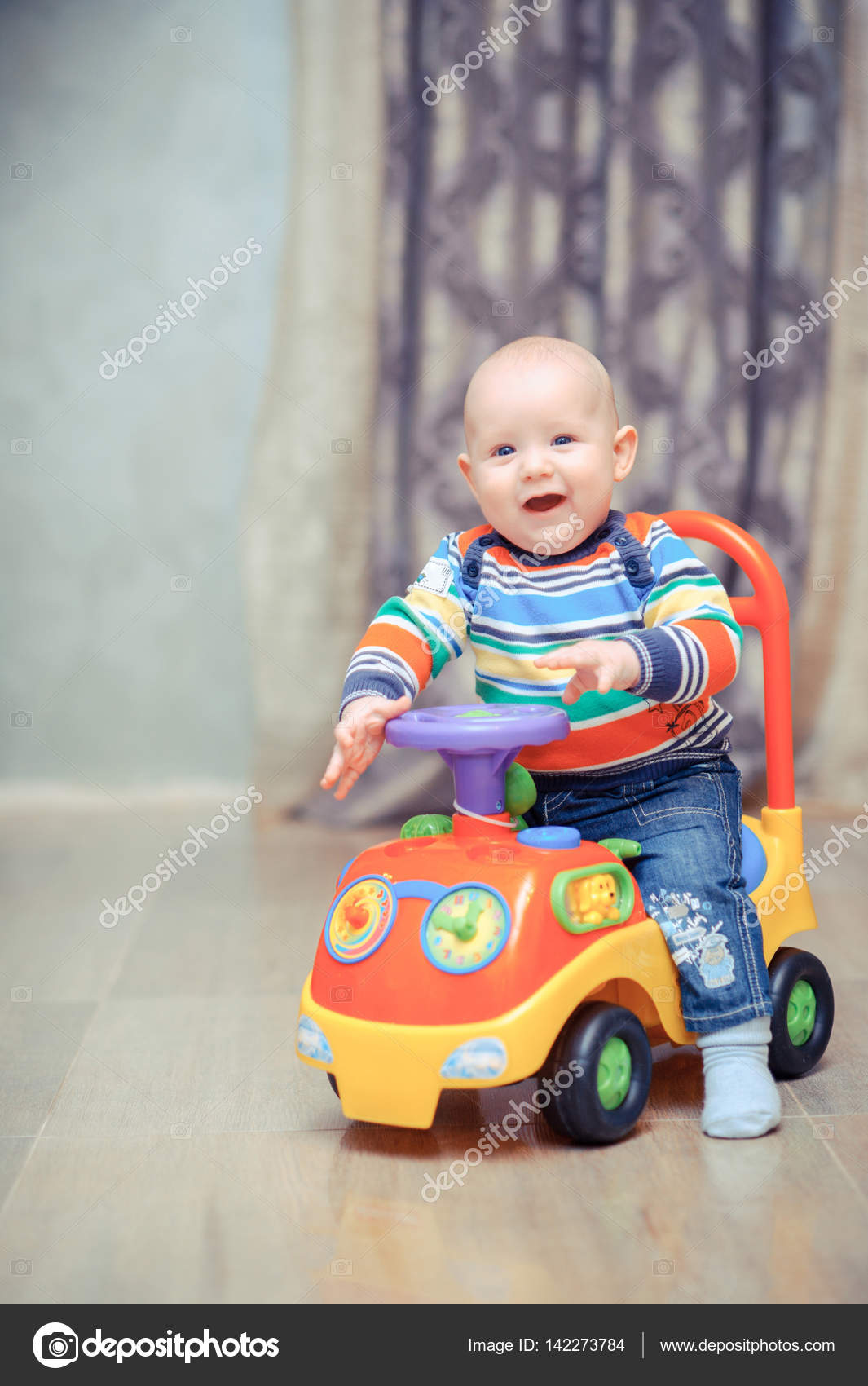 toy car baby sits in