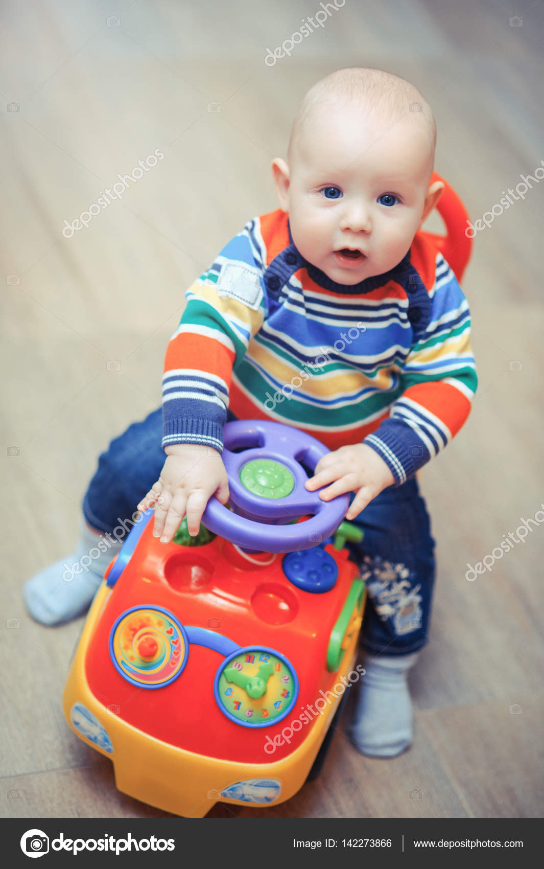 toy car baby sits in