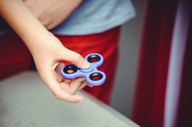 Spinner elinde