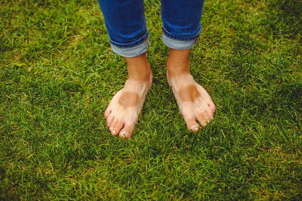 むらタンと人間の足 — ストック写真