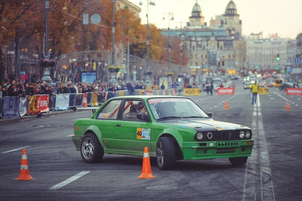 Automobile slalom and drift competitions in the city center, car on the road with cones — Stock Photo, Image