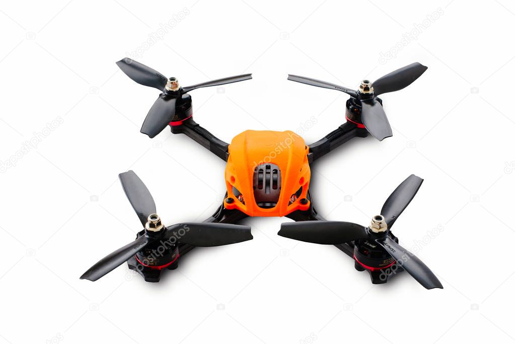 The beginning of the racing drone assembly. Durable frame of an unmanned aerial vehicle, made of carbon fiber and 3d printing, isolated on a white background
