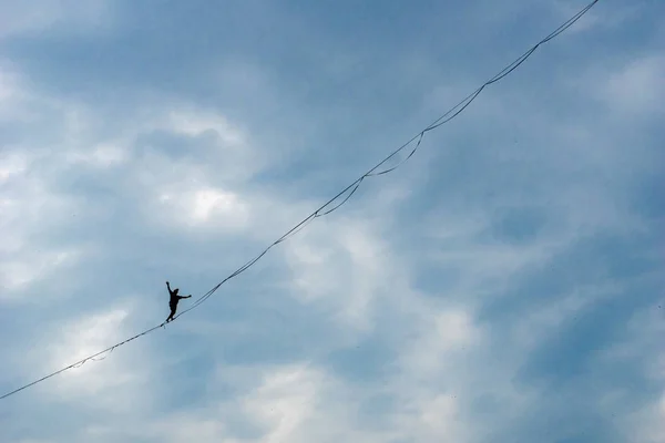 Man Walking Strecthed Sling Performance Tightrope Walker Background Dramatic Clouds — 스톡 사진