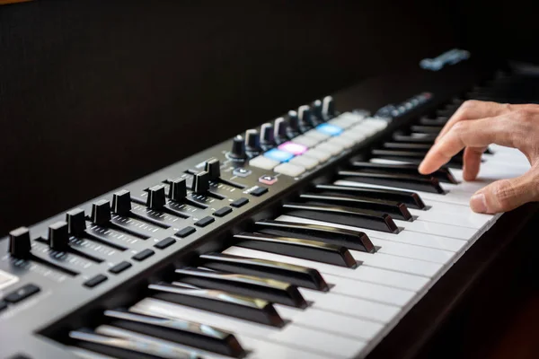 MIDI keyboard synthesizer piano keys closeup for electronic music production / recording
