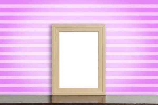 Blank Wooden photo frame on table with Pink stripe background. — Stock Photo, Image