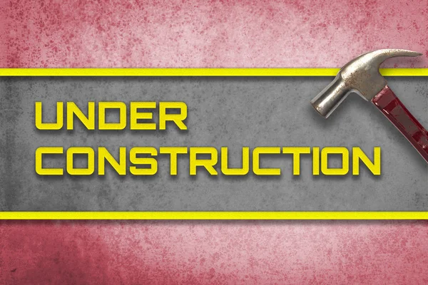 Red under construction hammer banner for website — Stock Photo, Image