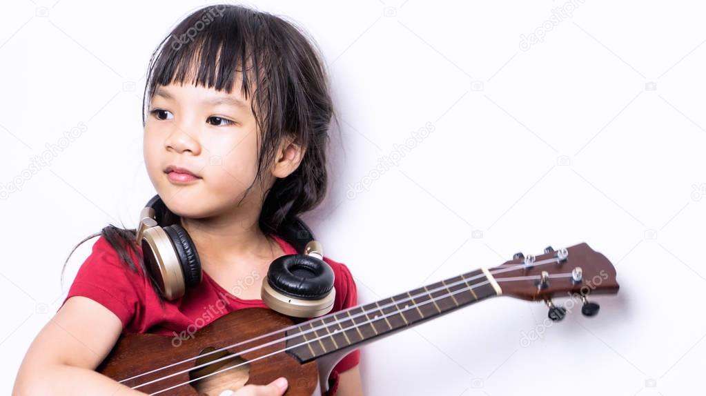 North korean girl playing guitar