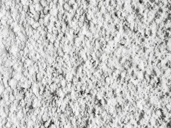 Белая бетонная стена с закрытой текстурой — стоковое фото