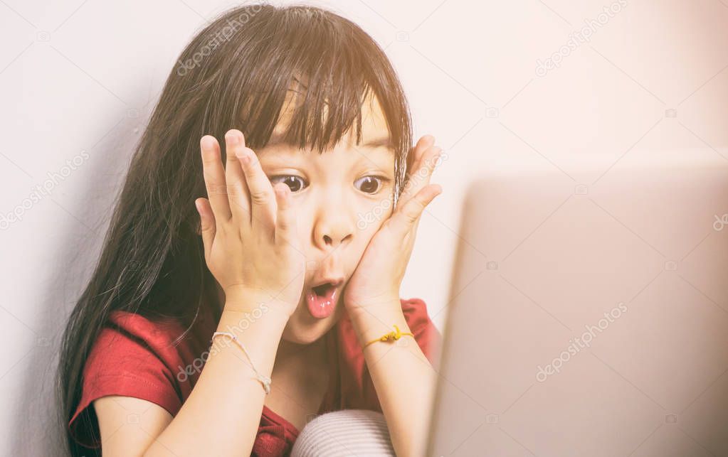 Little Asian girl is shock with what she see on the Internet. Parent should be more careful on how their kid using the computers.