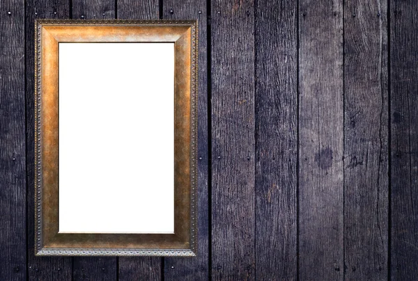 Blank vintage picture frame on rustic wood.