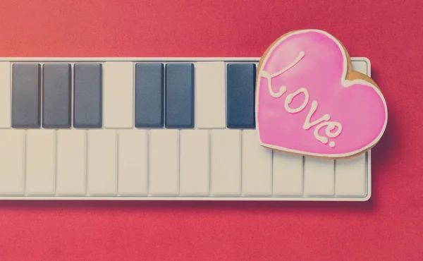 Love Music Heart on small keyboard in vintage tone.