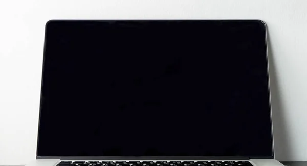 Blank laptop notebook screen on white