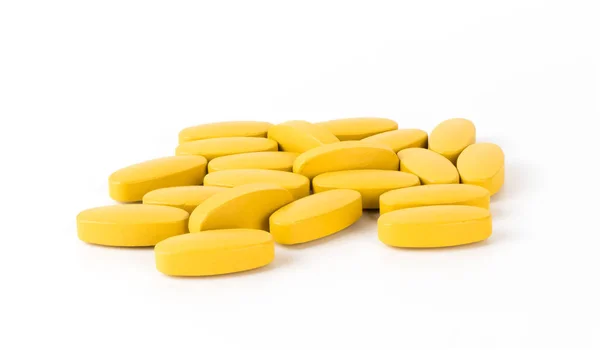 Massa C-Vitamin tabletter isoalted på vit bakgrund — Stockfoto