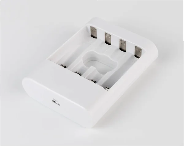 Charge de batterie blanche isoaltée sur fond blanc — Photo