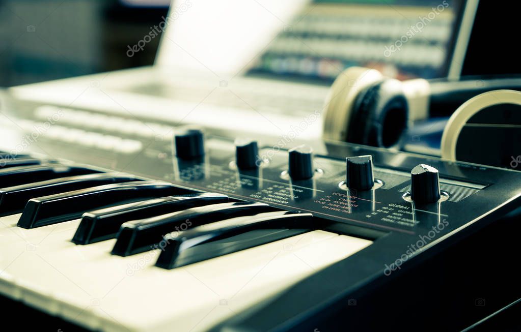 Synthesizer keyboard on home music studio set up