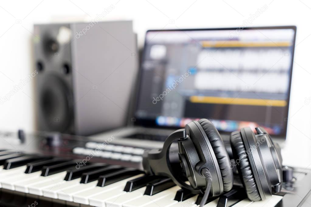 Home Studio recording Equipment with keyboard and headphone