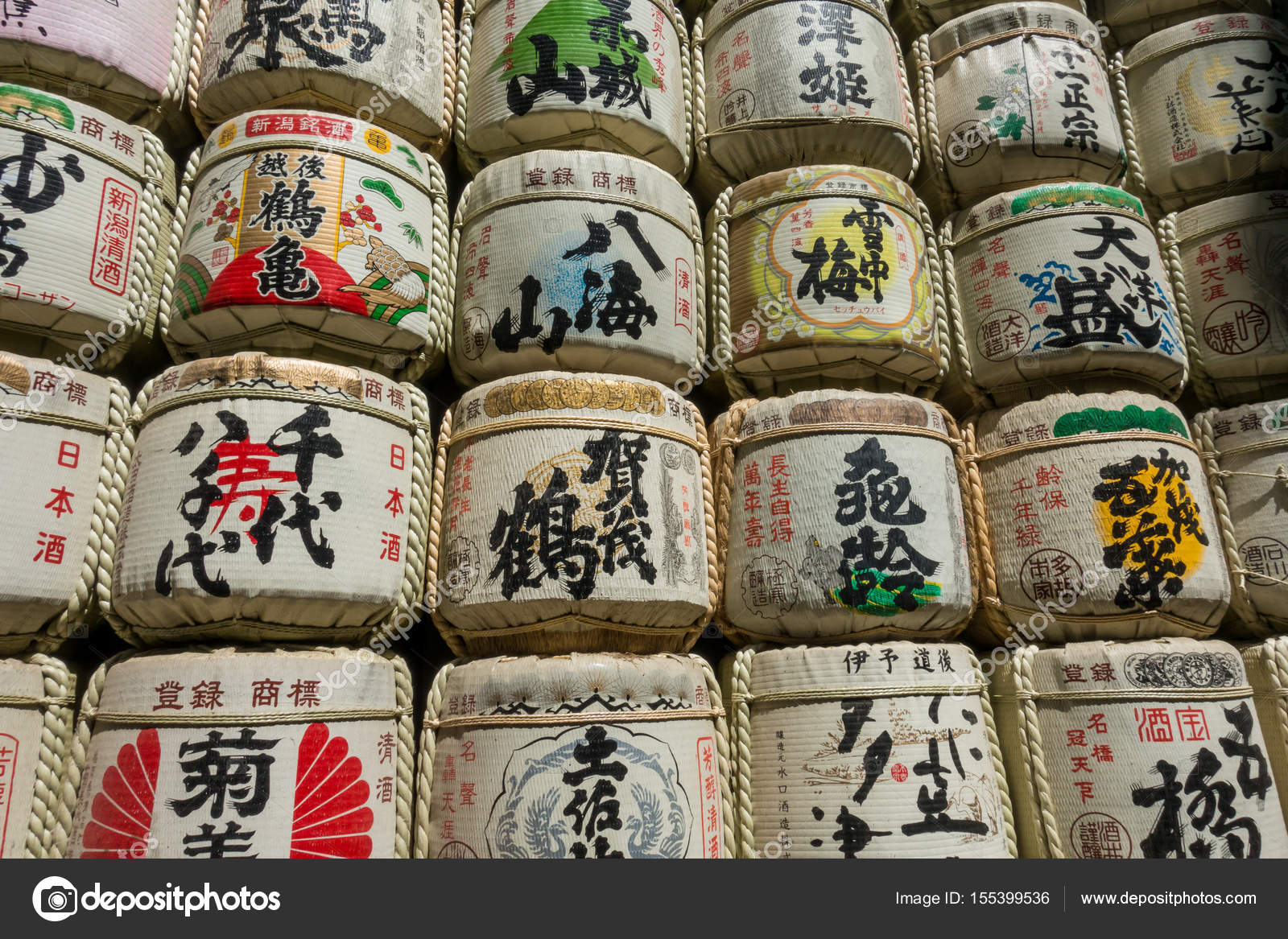 Sake Barrels stock up wall in Meiji Shrine. – Stock Editorial Photo