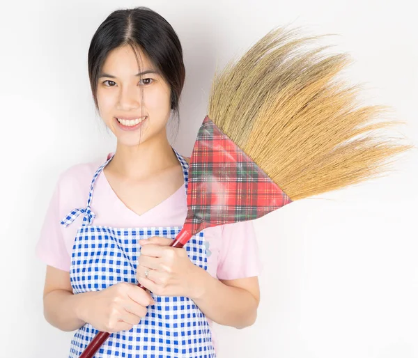 Asian Maid holding a broom ready to work — Stock Photo, Image