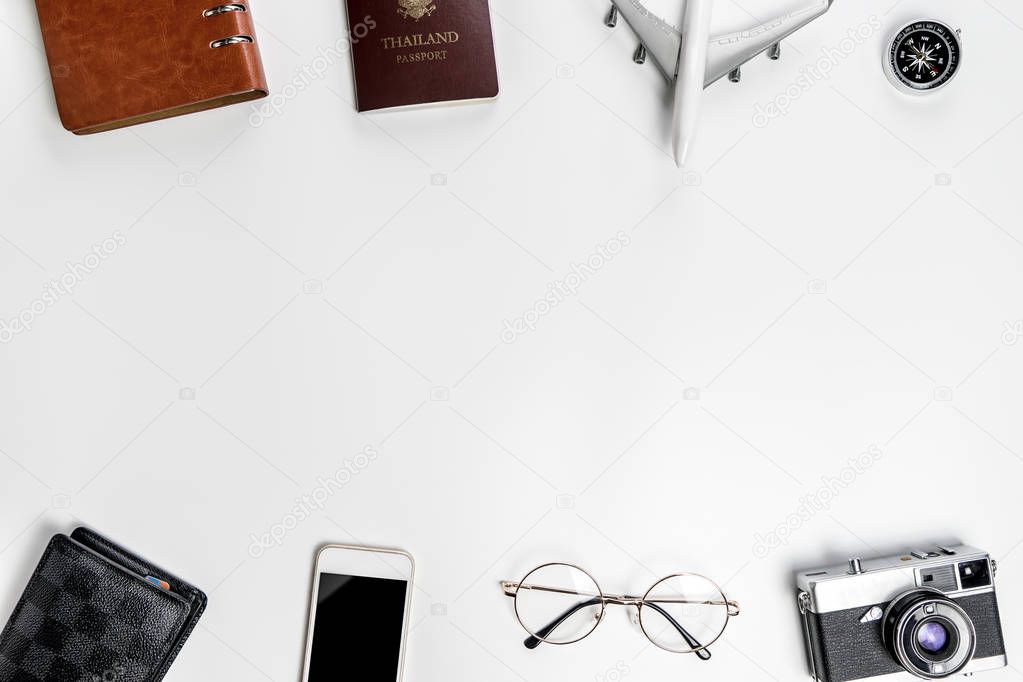 Business traveler objects on white with middle copy space