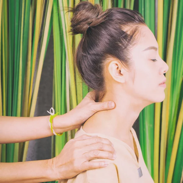 Women is getting massage on her neck — Stock Photo, Image