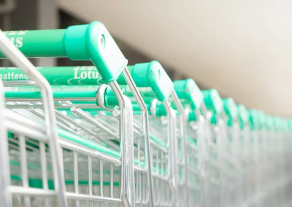 Tesco Lotus trolley carts lining up for customer. — Stock Fotó