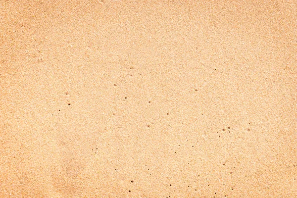 Textura de superfície de areia laranja com pequeno orifício — Fotografia de Stock