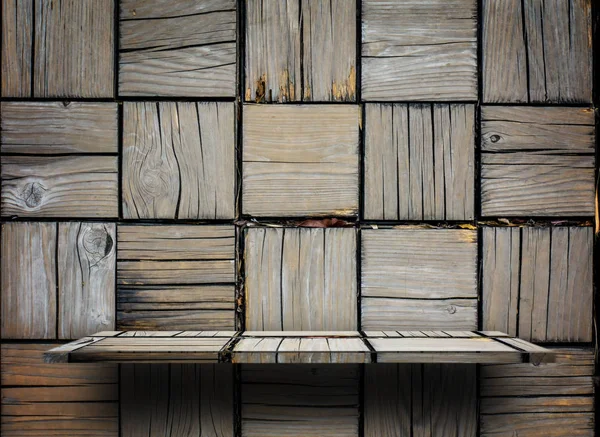 Old empty wooden shelf on Wooden block background