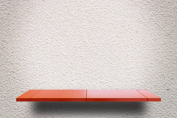 Empty Red metal shelf display on gray cement wall for product display counter