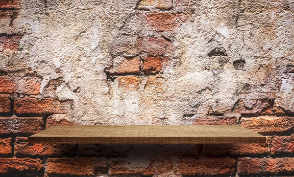 Empty wooden counter display on Cracked wall red brick