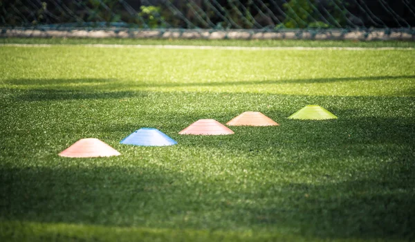 Soccer sport training equipments on green outdoor soccer trainin — Stock Photo, Image