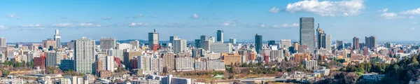 Panoramic photo of Sendai City from high angle in Daytime with bright bluesky and cloud