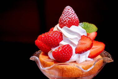 Japanese strawberry and cream dessert ice cream with icing and cake