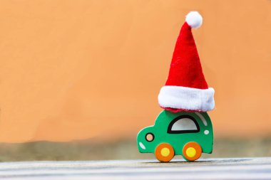 Noel arka plan kavramı. Oyuncak araba bir Noel Baba ha