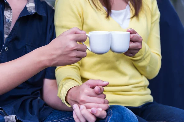 Hot coffee in the hands of a loved one