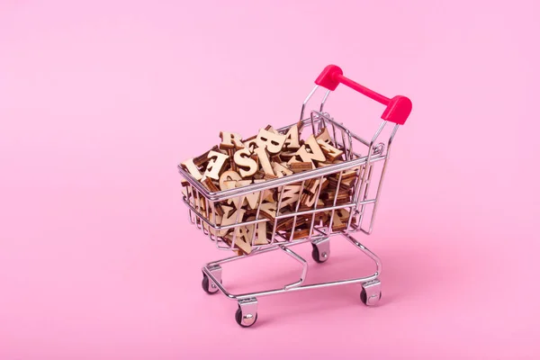 Shopping cart with alphabet — Stock Photo, Image