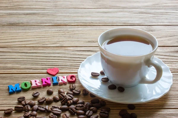 Sabah kelime ve bir fincan kahve — Stok fotoğraf