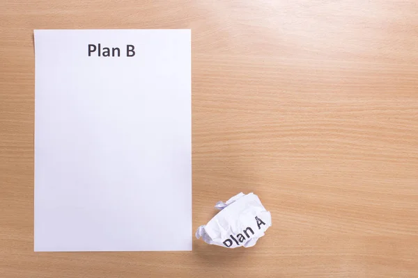 Crumpled paper Plan A and clean sheet Plan B — Stock Photo, Image