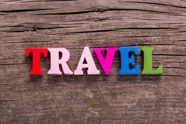 Travel word made of wooden letters — Stock Photo, Image
