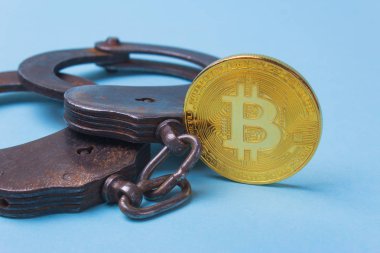 Kelepçe ile para bitcoin ve suç için ceza.