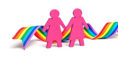 İki lezbiyen kız el ele tutuşuyor. Lgbt gökkuşağı kurdelesiyle beyaz arkaplanda izole edilmiş.