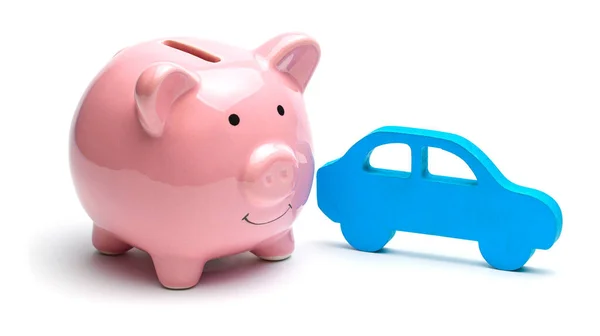Pink piggy bank and blue car isolated on white background. Concept of saving money on buying a car or car on credit — Stock Photo, Image