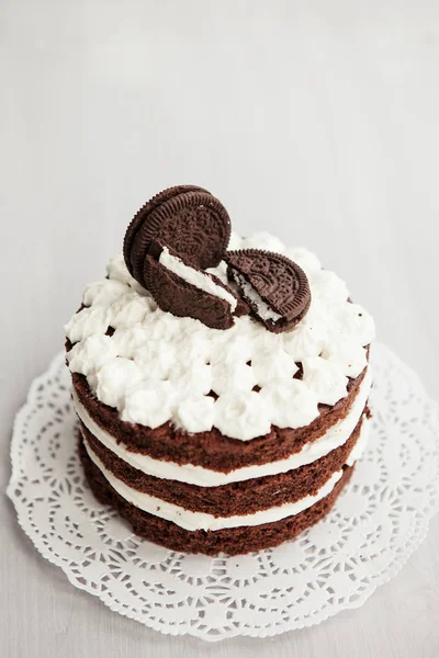 white chocolate cream cake decorated with bi