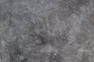 Gri taştan bir arka planın dokusu. Koyu çimento ve beton doku.