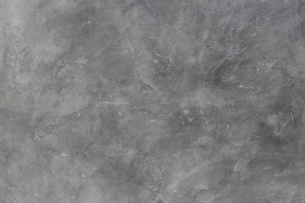 Gri taştan bir arka planın dokusu. Koyu çimento ve beton doku.