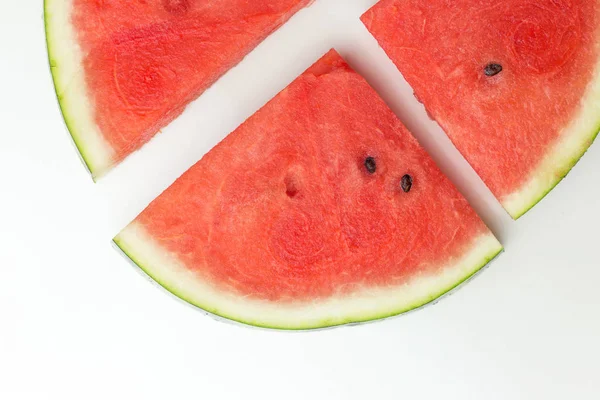 Närbild av färska skivor av röd vattenmelon, top view, sommar eller mat koncept — Stockfoto
