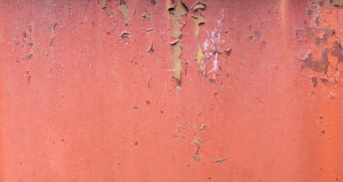 Eski Rusty metal arka planı boyadı. Kırmızı soyulmuş boya dokusu.
