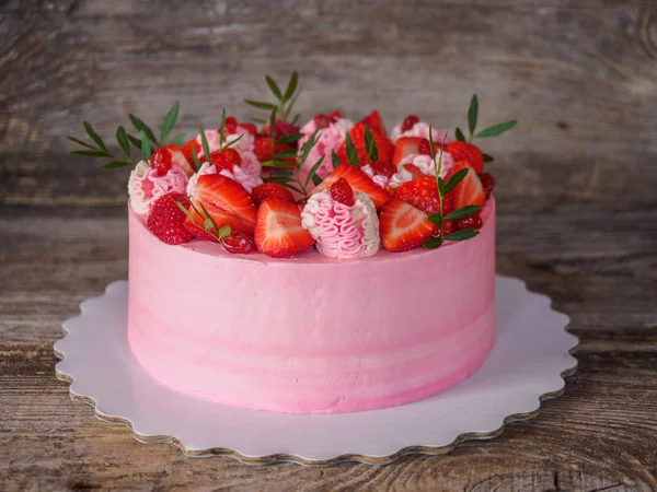 homemade tender pink cake with strawberries