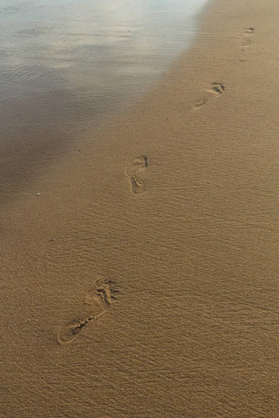 Footprints on sand — Stock Photo, Image