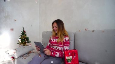 Young Girl Portrait Smile Show Point Green Screen Tablet Christmas Tree Bokeh Xmas Eve Lights New Year Confetti at Home