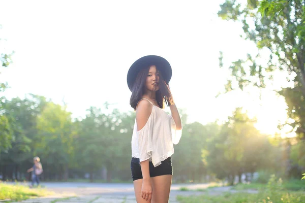 Wonderful female hat asian sunset cheerful emotions laughter — Stock Photo, Image